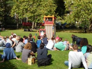 Enjoying the Punch and Judy show